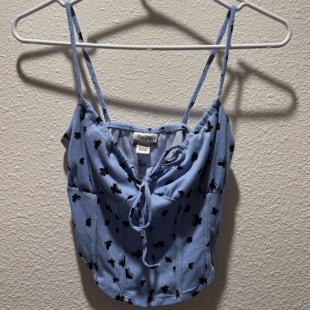 Rue21 Blue cropped tank tie front and black butterfly detailing Never worn!!!